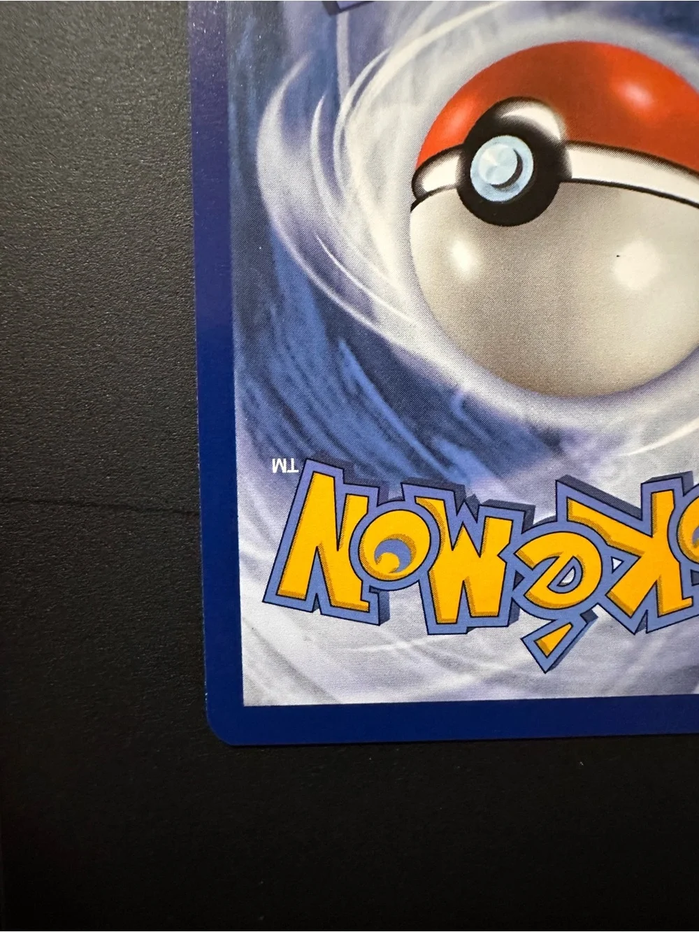Pokemon card being